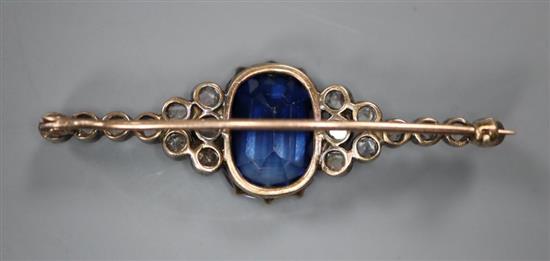 A late Victorian yellow and white metal, synthetic sapphire and rose cut diamond cluster set bar brooch, 48mm, gross 6.6 grams.